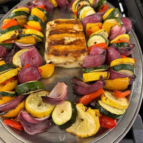 Grilled halloumi with vegetable skewers