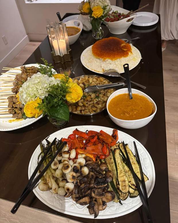 Persian table with saffron rice, kebabs, and grilled vegetables